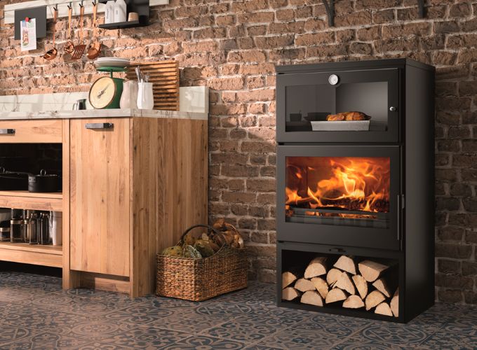 Kitchen environment with stove and wood-burning oven for cooking 