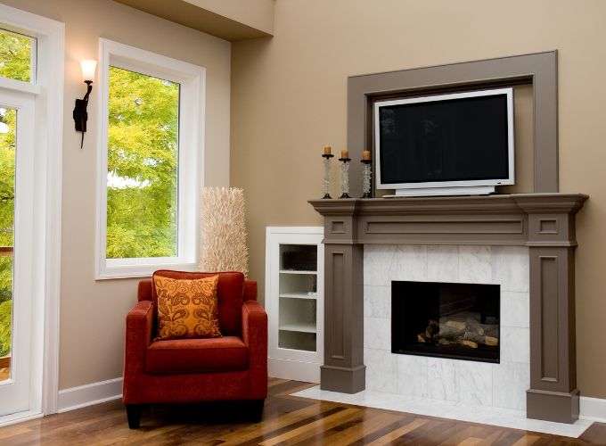 Combining fireplace and television together