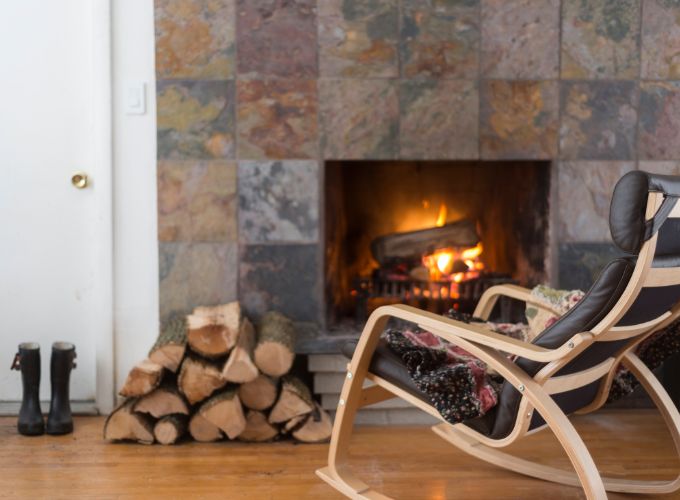 Open fireplace in the living room of a house