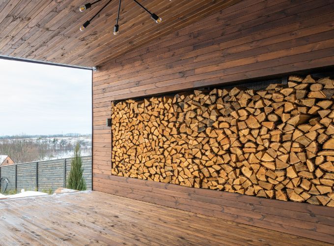 Storing firewood on a wooden shelves